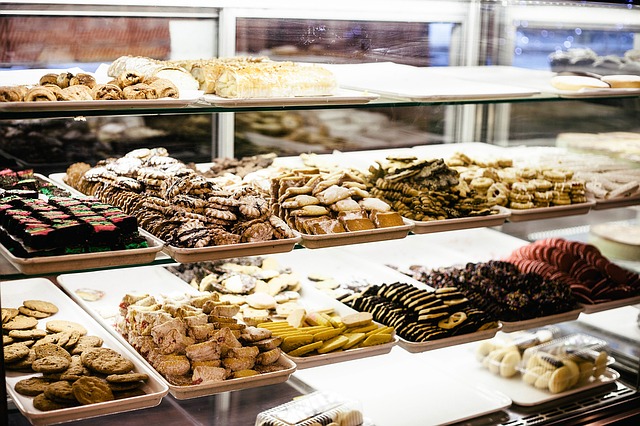 Trays of biscuits in a shop.